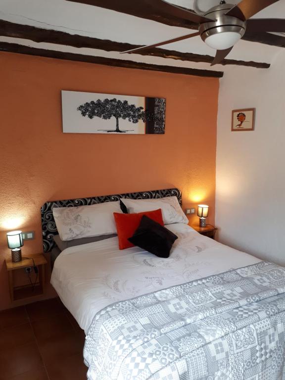A bed or beds in a room at Casa de Bello