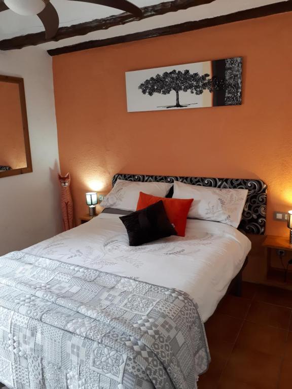 A bed or beds in a room at Casa de Bello