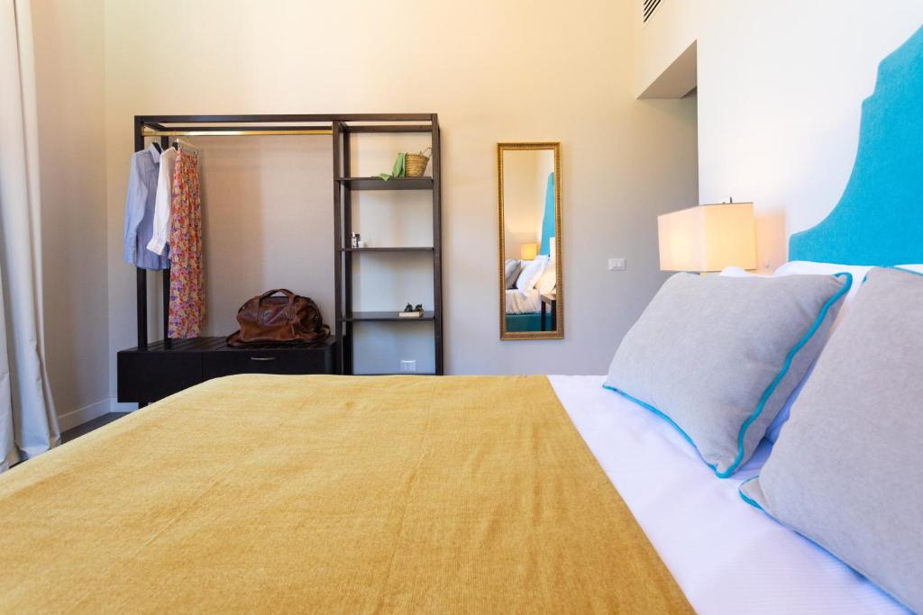 Postel nebo postele na pokoji v ubytování Villa Masetta - Luxury Suites