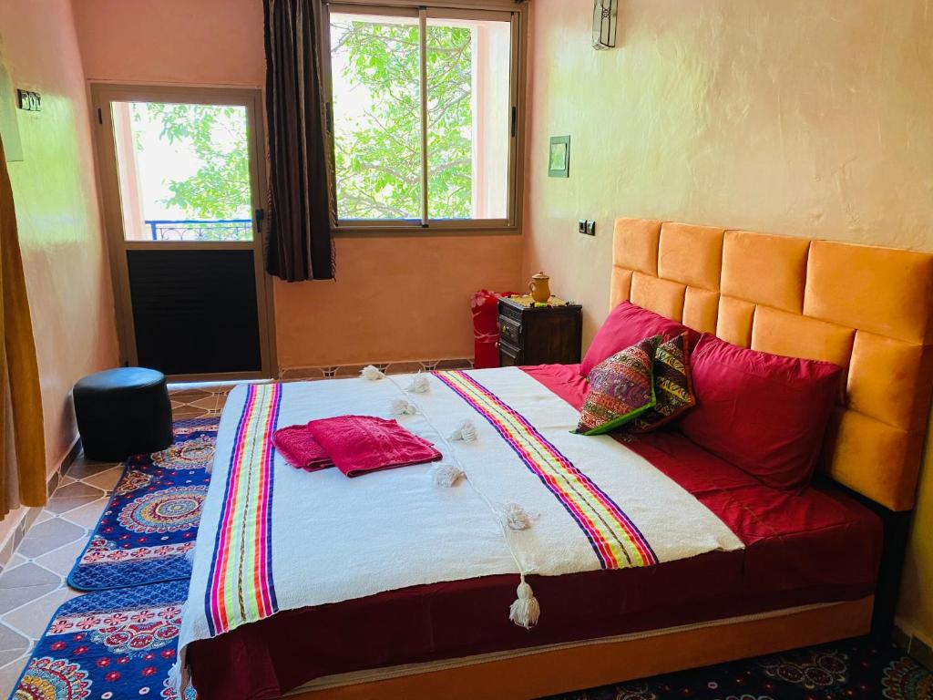 Postel nebo postele na pokoji v ubytování Riad Atlas Garden
