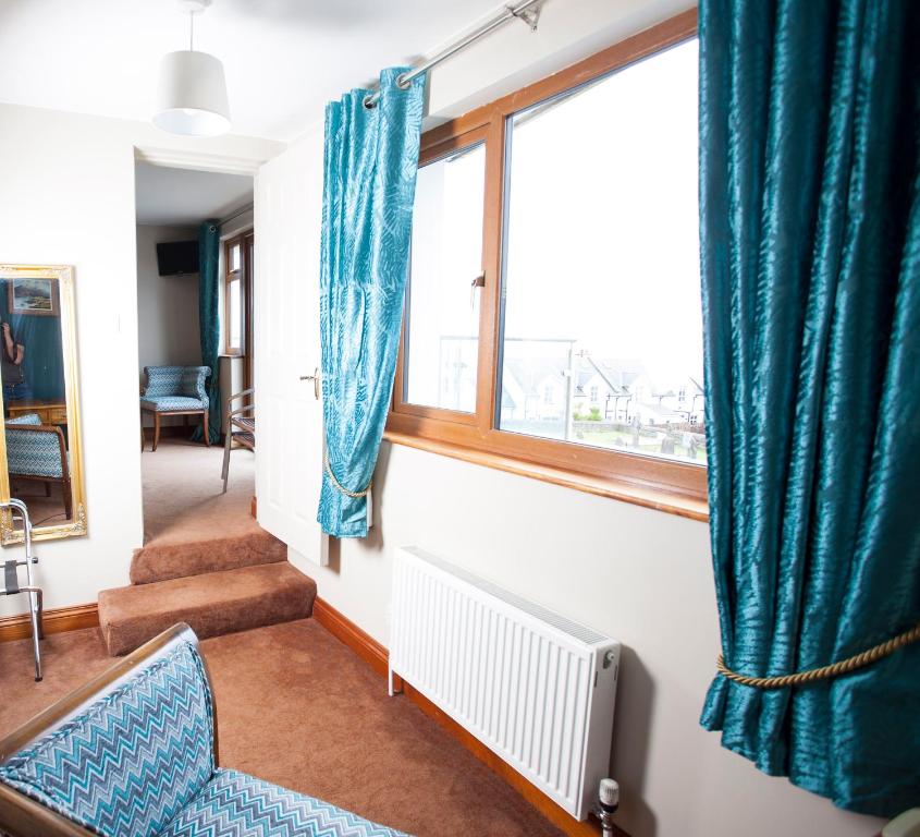 Posezení v ubytování Fort Conan Hotel