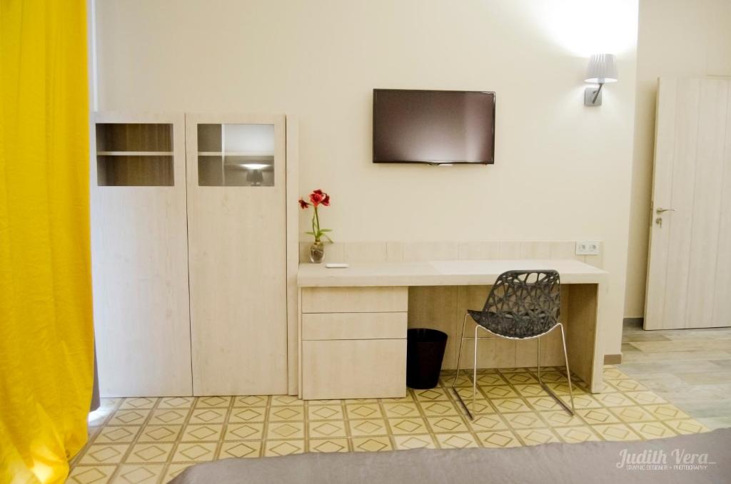 TV a/nebo společenská místnost v ubytování Hostal 1888