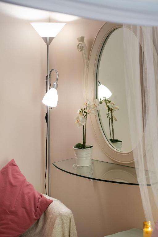 Postel nebo postele na pokoji v ubytování LEFKAS CITY APARTMENTS & Suites
