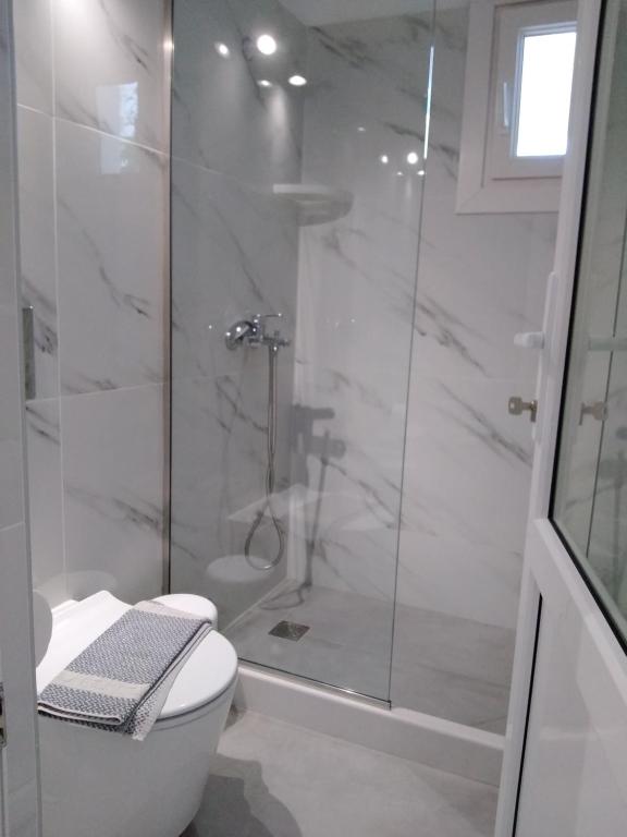 Koupelna v ubytování Asteri Hotel