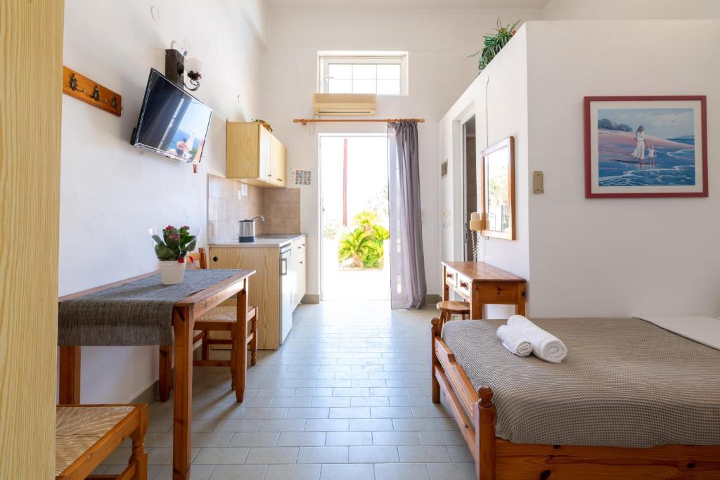 Postel nebo postele na pokoji v ubytování Pefkos View Apartments