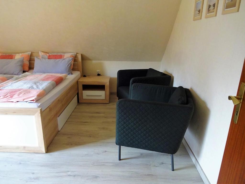 Postel nebo postele na pokoji v ubytování Ferienwohnung Schneemann