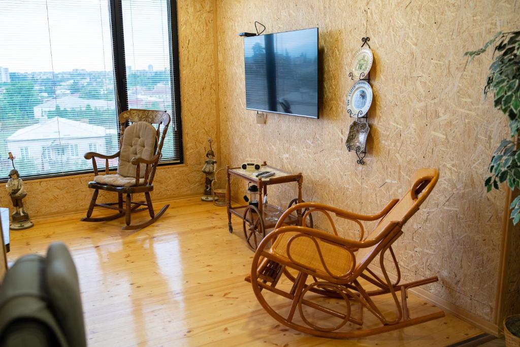 TV a/nebo společenská místnost v ubytování Hotel BANI