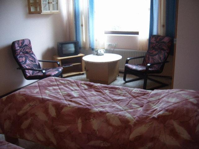 Postel nebo postele na pokoji v ubytování Hotel Takka-Valkea