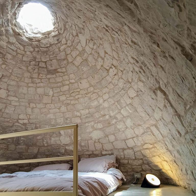 Postel nebo postele na pokoji v ubytování Masseria LoJazzo
