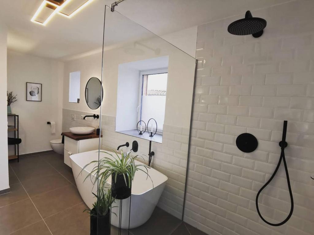 Phòng tắm tại Moderne Ferienwohnungen mit Designbad