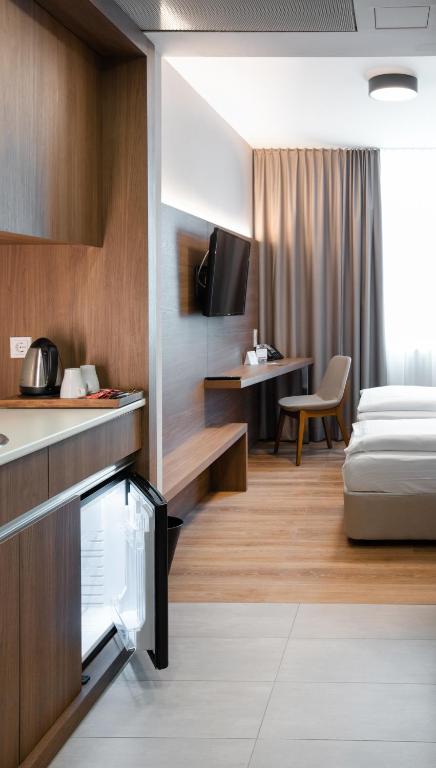 Postel nebo postele na pokoji v ubytování Ocak Aparthotel