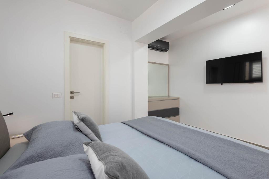 Postel nebo postele na pokoji v ubytování Villa Marina