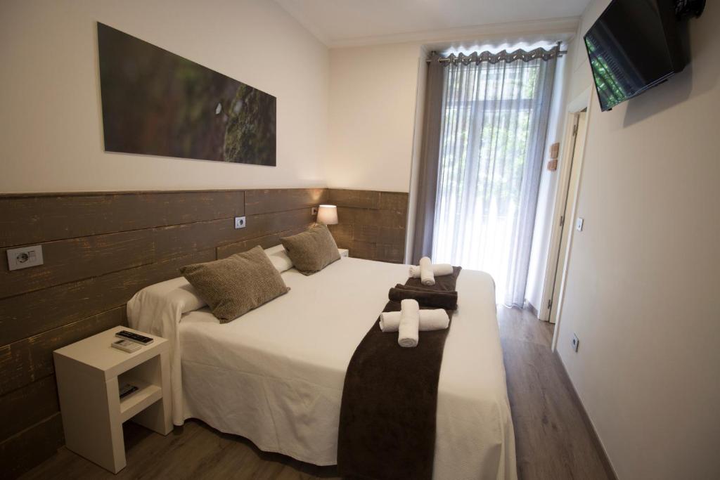 Cama o camas de una habitación en Pensión San Martin