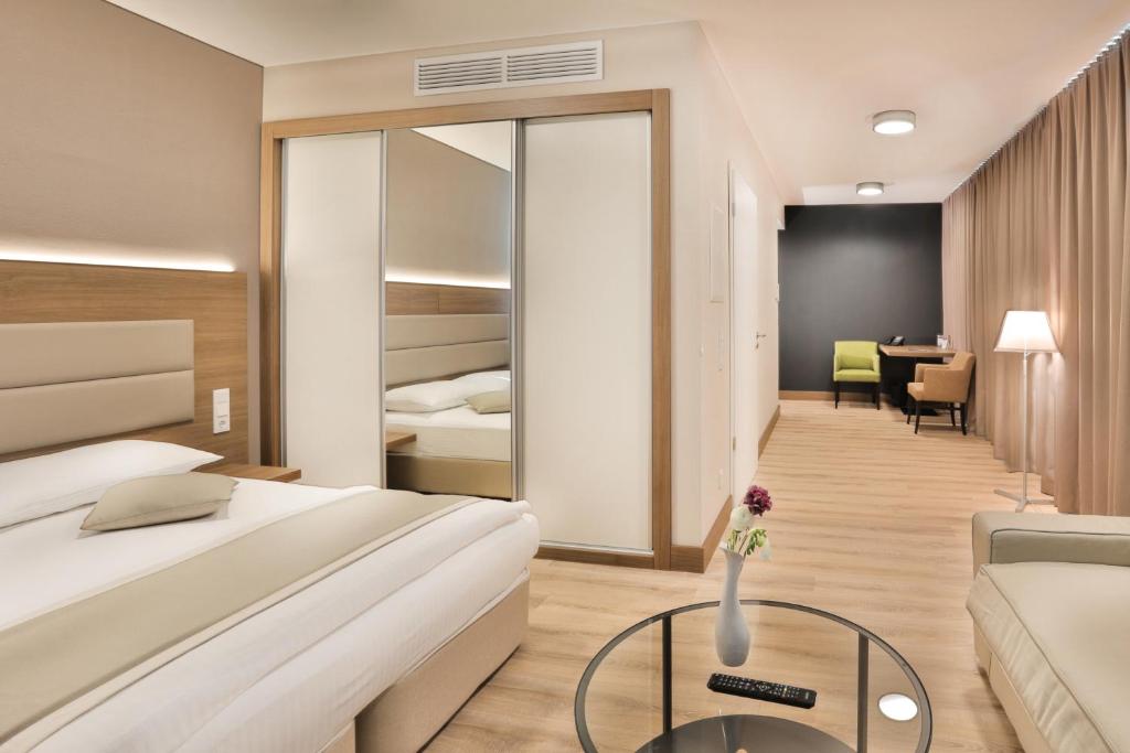 Postel nebo postele na pokoji v ubytování Ocak Aparthotel