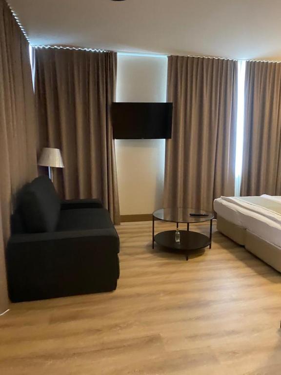 Postel nebo postele na pokoji v ubytování Ocak Aparthotel