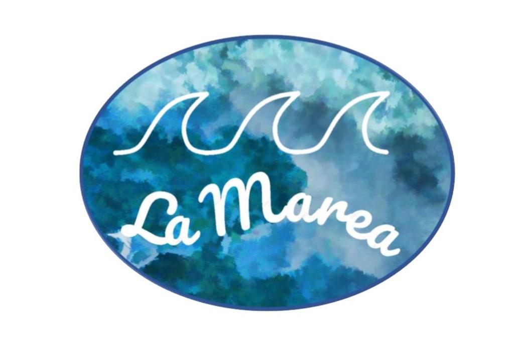 a sign that says mama with a blue sky and clouds at Apartamento La Marea in Las Palmas de Gran Canaria