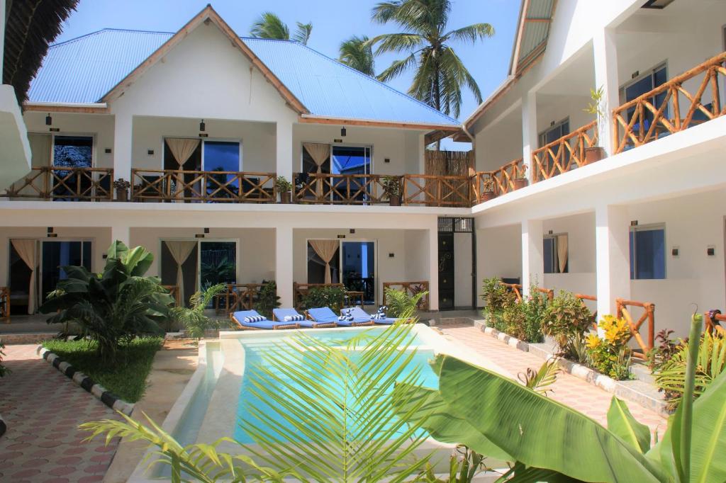 an image of a villa with a swimming pool at Hakuna Matata Boutique in Paje