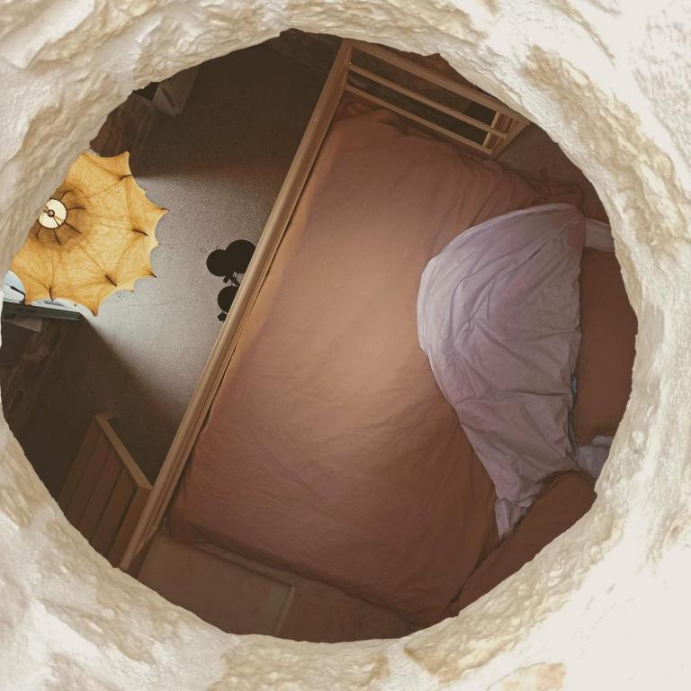 Postel nebo postele na pokoji v ubytování Masseria LoJazzo