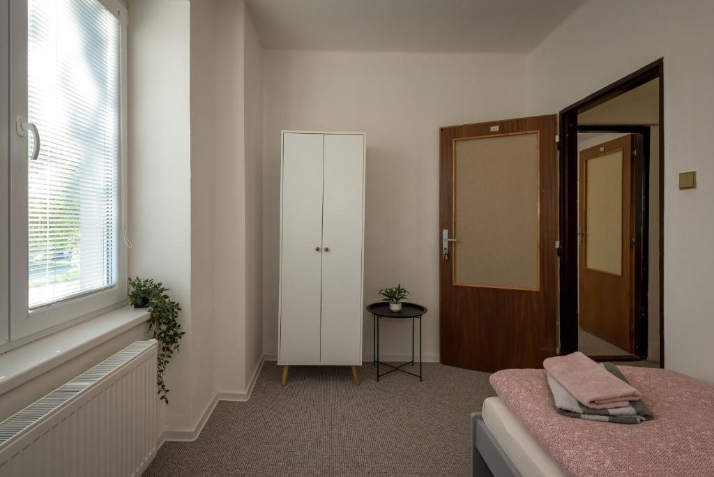 A bed or beds in a room at Hostel 26