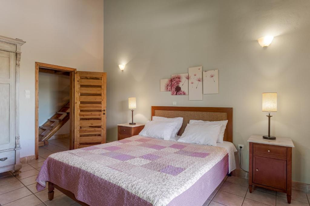 Postel nebo postele na pokoji v ubytování Tierra Olivo Villas