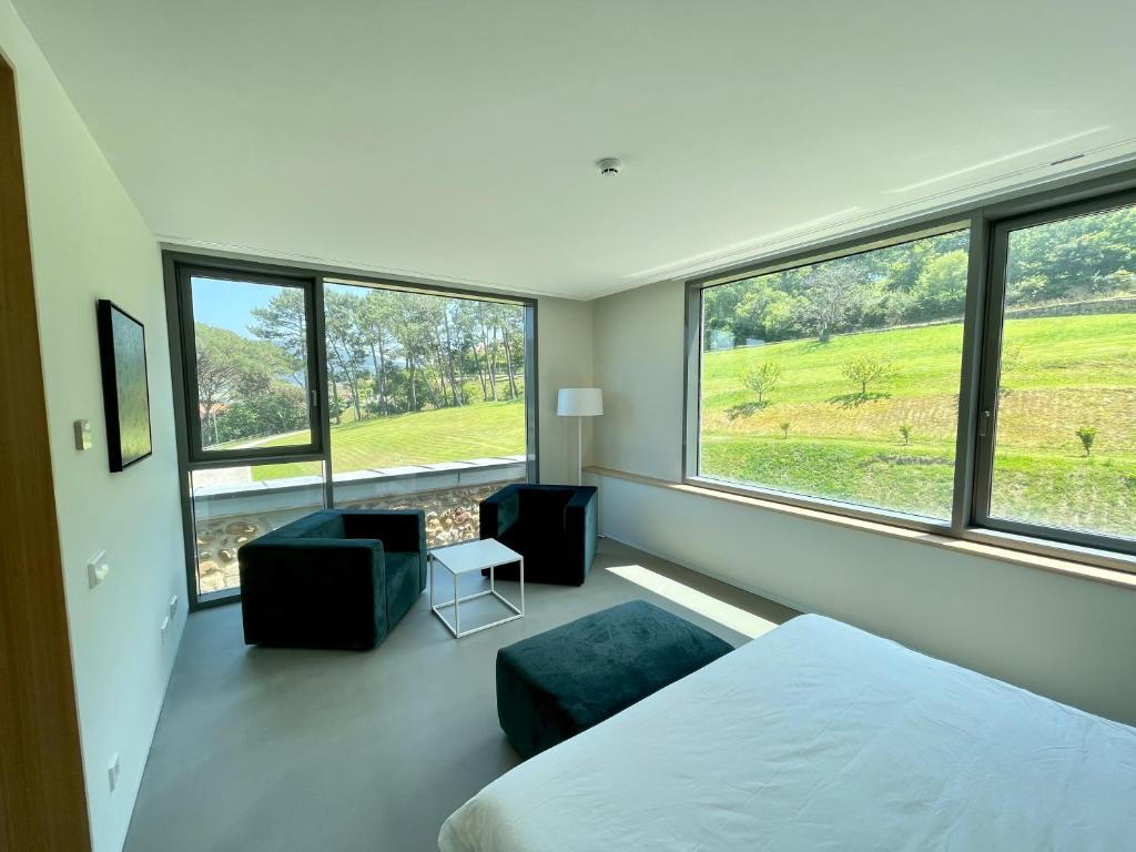 Postel nebo postele na pokoji v ubytování Hotel Pico Velasco
