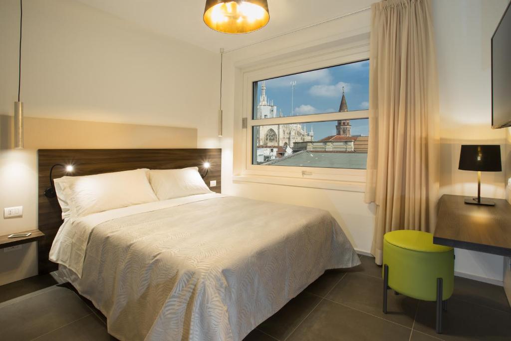 Postel nebo postele na pokoji v ubytování Enjoy Duomo - Flavio Baracchini 9 - Rooms