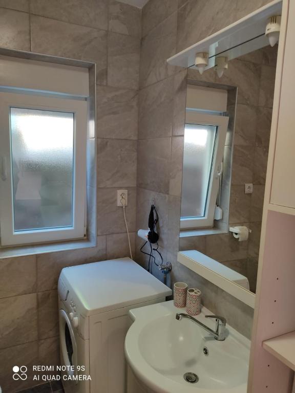 Koupelna v ubytování Apartmani Iva