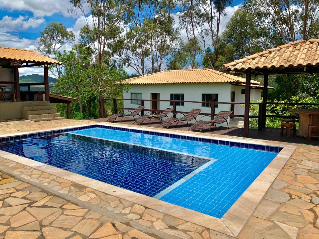 Bazén v ubytování Casa de Temporada em Capitólio (Paz e Tranquilidade) nebo v jeho okolí