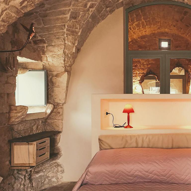 Postel nebo postele na pokoji v ubytování Masseria LoJazzo