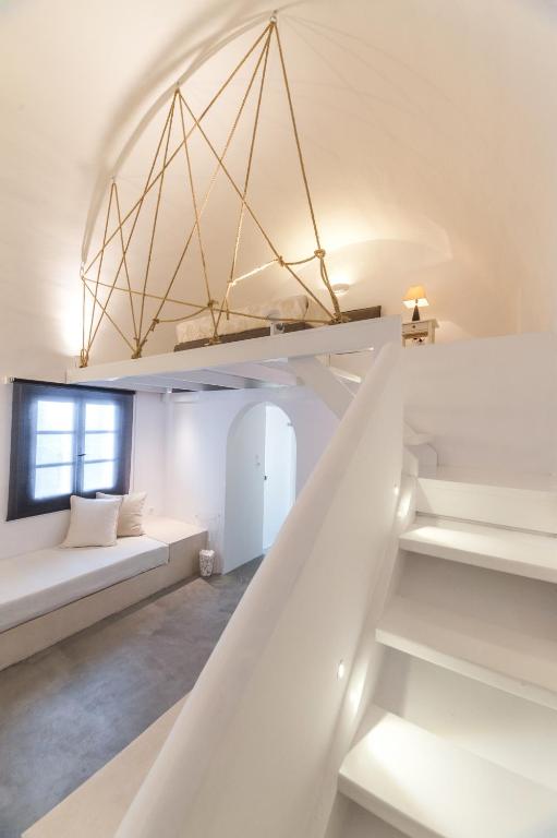 Letto o letti in una camera di Artemis Suites