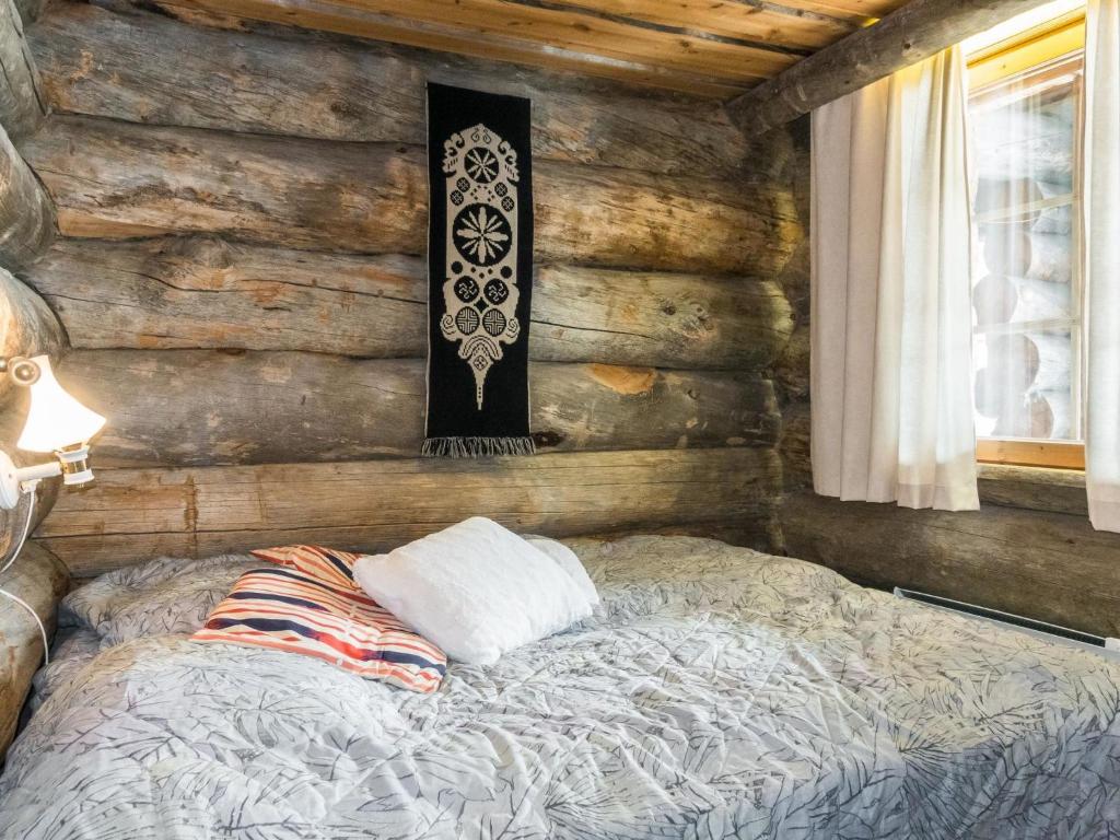 Postel nebo postele na pokoji v ubytování Holiday Home Luostonseita 1 by Interhome