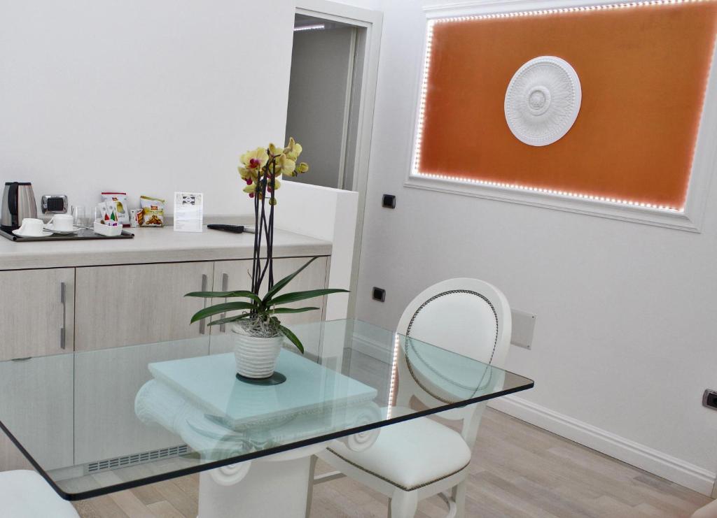 Kuchyň nebo kuchyňský kout v ubytování Boutique Hotel Paradiso Bovelacci