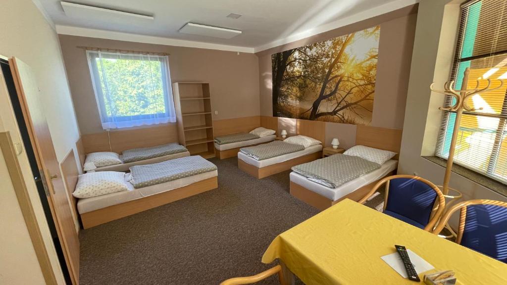 Postel nebo postele na pokoji v ubytování Penzion Florian