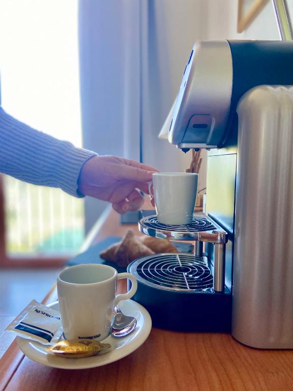 Příslušenství pro přípravu čaje a kávy v ubytování Hotel Paradiso Como