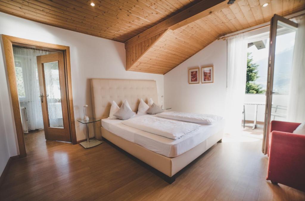 Postel nebo postele na pokoji v ubytování Guesthouse Christine