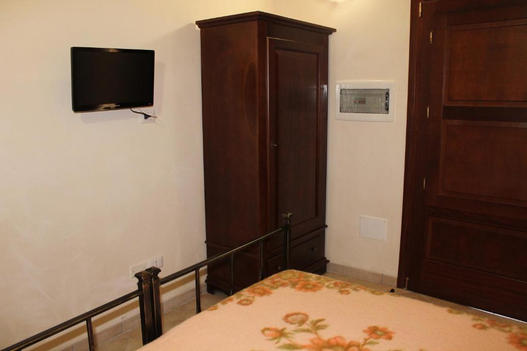 Postel nebo postele na pokoji v ubytování Masseria Cricelli