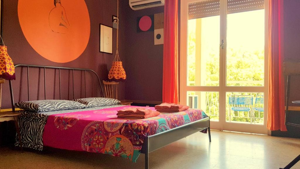 A bed or beds in a room at Domus LouLou