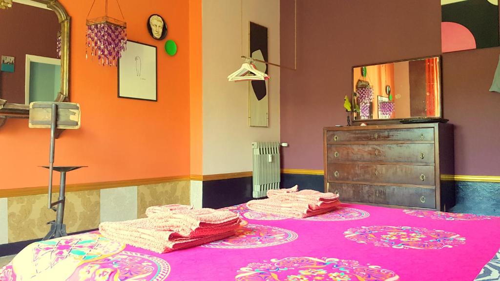 A bed or beds in a room at Domus LouLou