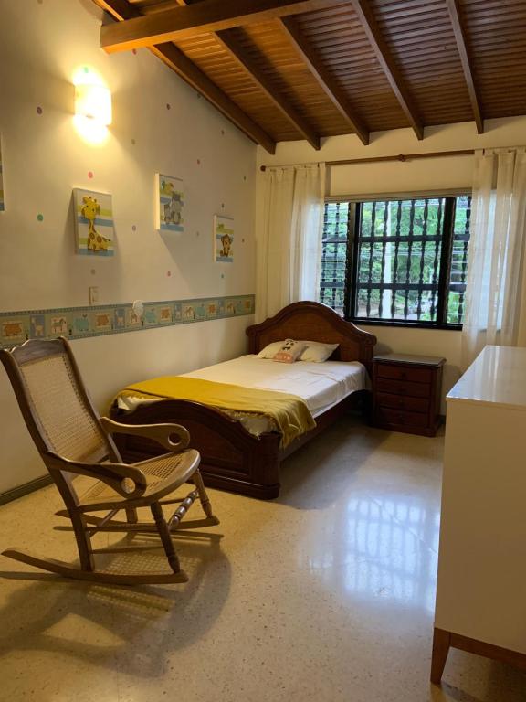 Postel nebo postele na pokoji v ubytování Casa Rosales