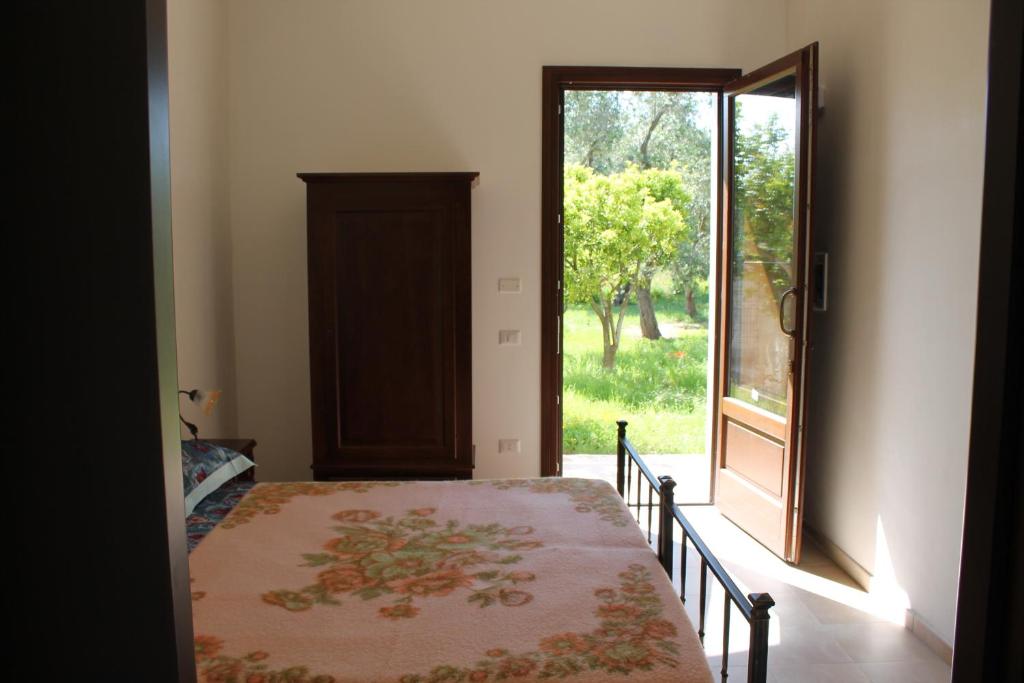 Postel nebo postele na pokoji v ubytování Masseria Cricelli