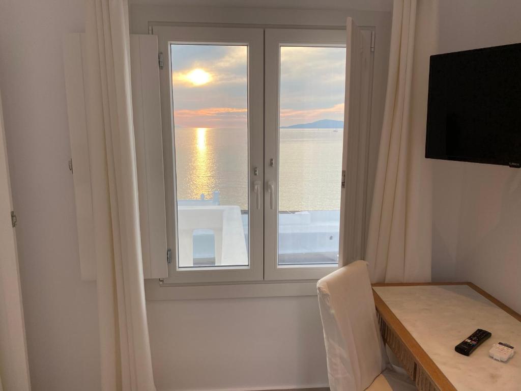 TV a/nebo společenská místnost v ubytování BAY VIEW RESIDENCE