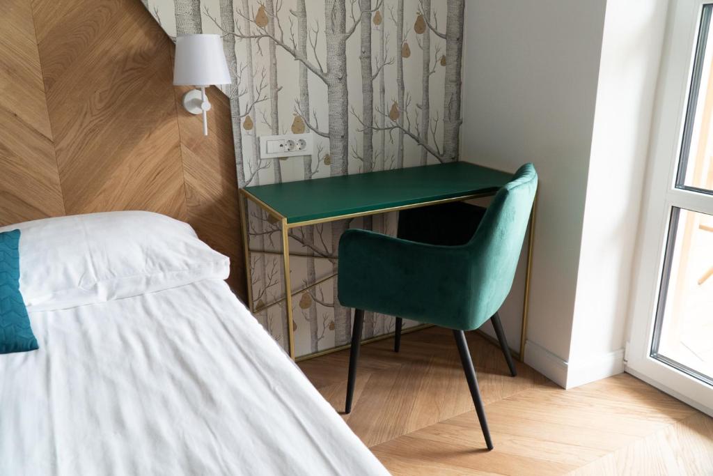 Postel nebo postele na pokoji v ubytování Hotel Starkl - Heritage & Unique