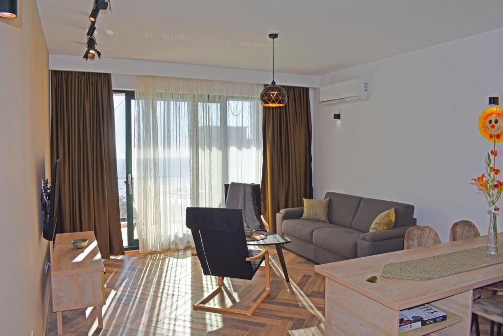 Posezení v ubytování White Star Apartments