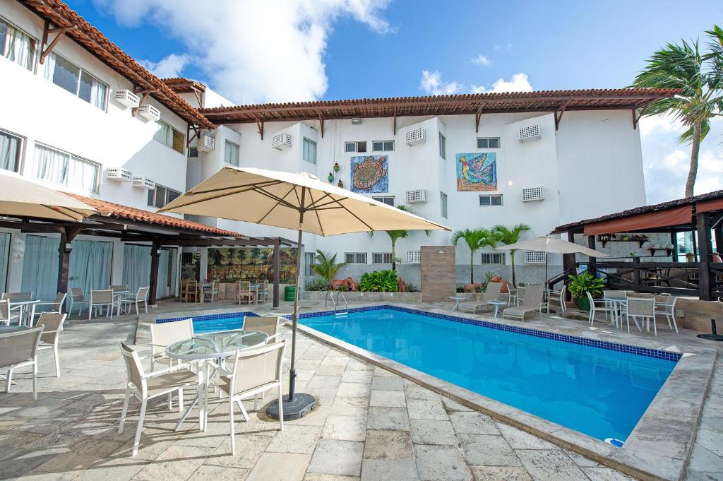 A piscina localizada em Hotel Costeiro ou nos arredores