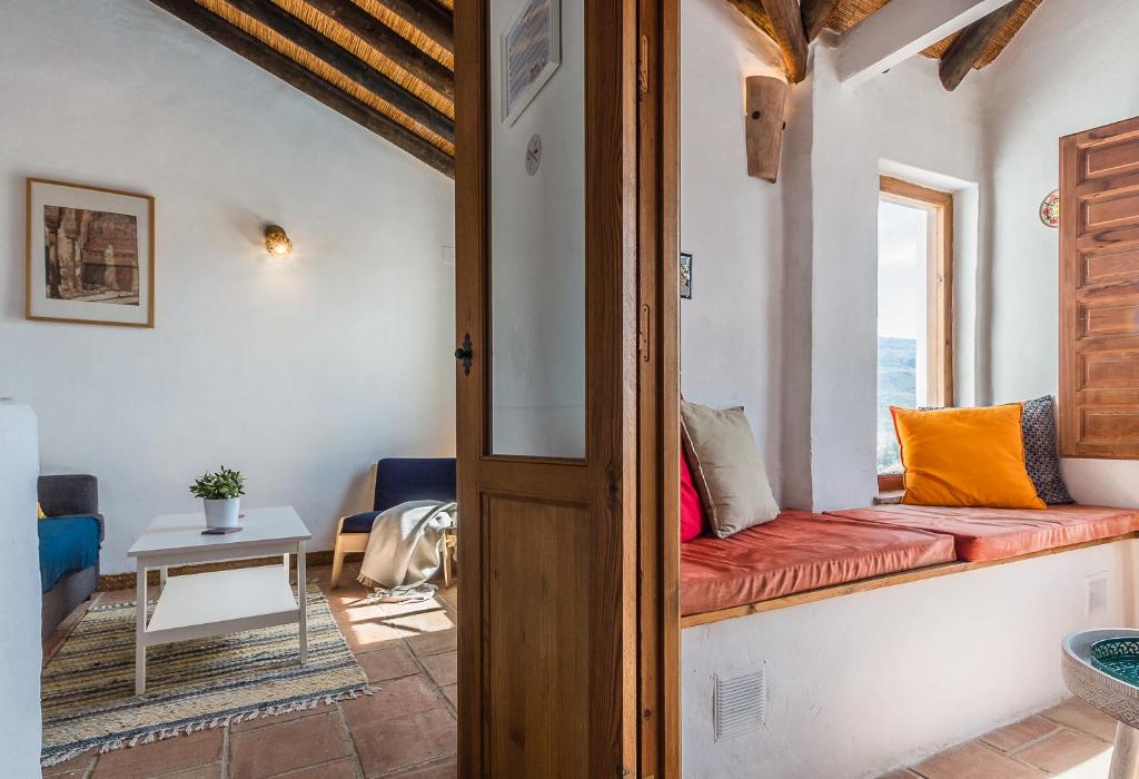 A seating area at Casa Sol - traditional village house with pool and view