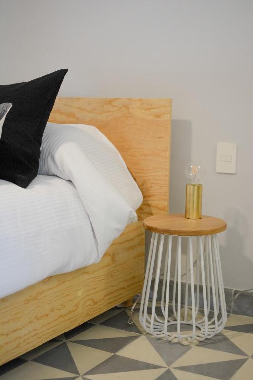 Postel nebo postele na pokoji v ubytování Hotel Casona Independencia