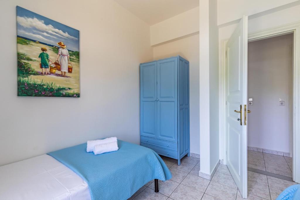 Posteľ alebo postele v izbe v ubytovaní Casa Mia - 5 min from Stafilos beach