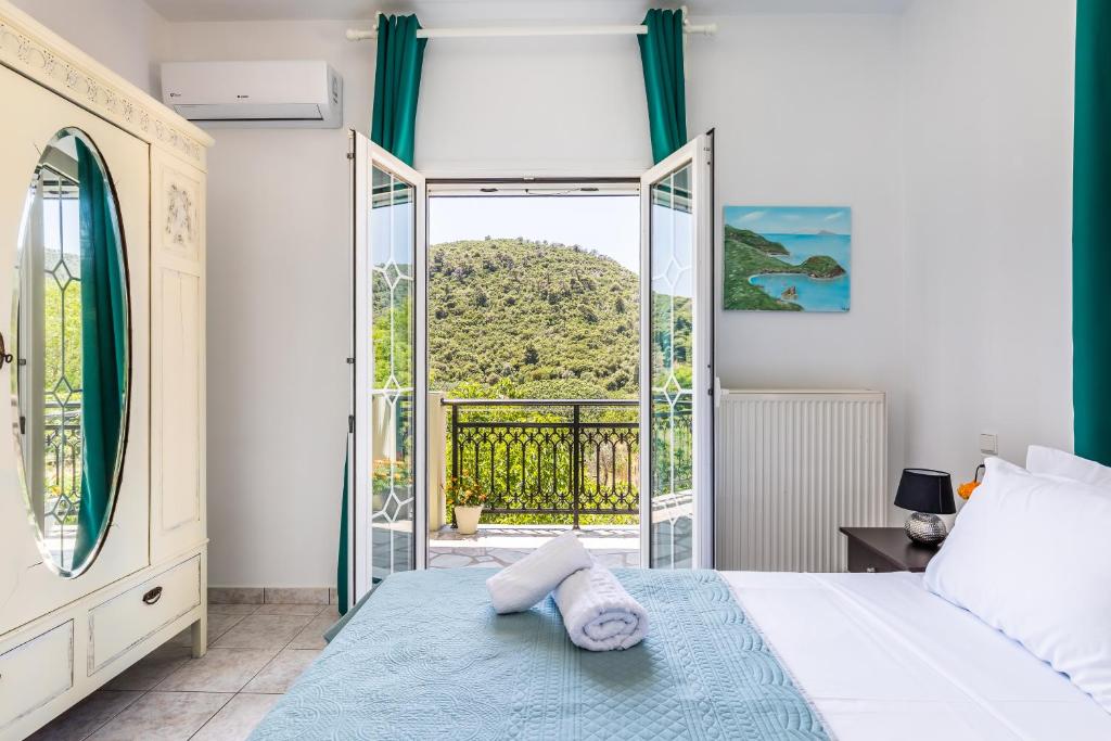 Posteľ alebo postele v izbe v ubytovaní Casa Mia - 5 min from Stafilos beach