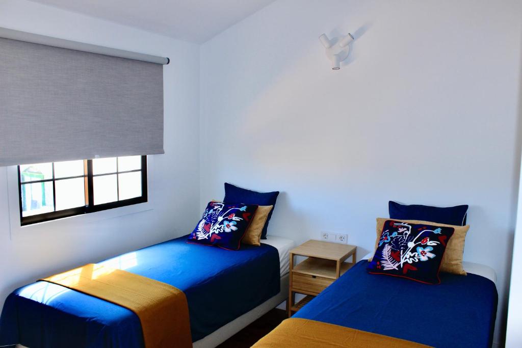 Postel nebo postele na pokoji v ubytování 3BDR + 2BATH Comfy House El Medano