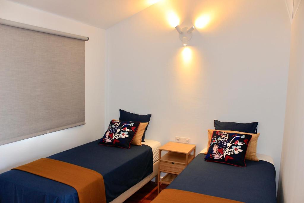 Postel nebo postele na pokoji v ubytování 3BDR + 2BATH Comfy House El Medano